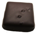 Ganache chocolat noir à la pulpe de Yuzu (sulfite, lait, lécithine de soja)